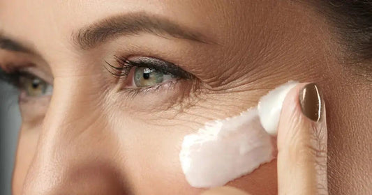 Application of best anti-aging eye creams to reduce dark circles and fine lines.
