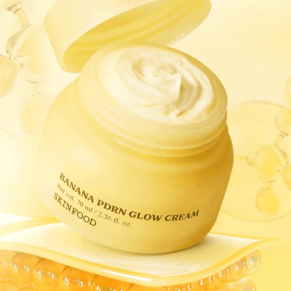 Skinfood Banana PDRN Glow Cream jar with a soft yellow cream, highlighting skin nourishment and hydration.