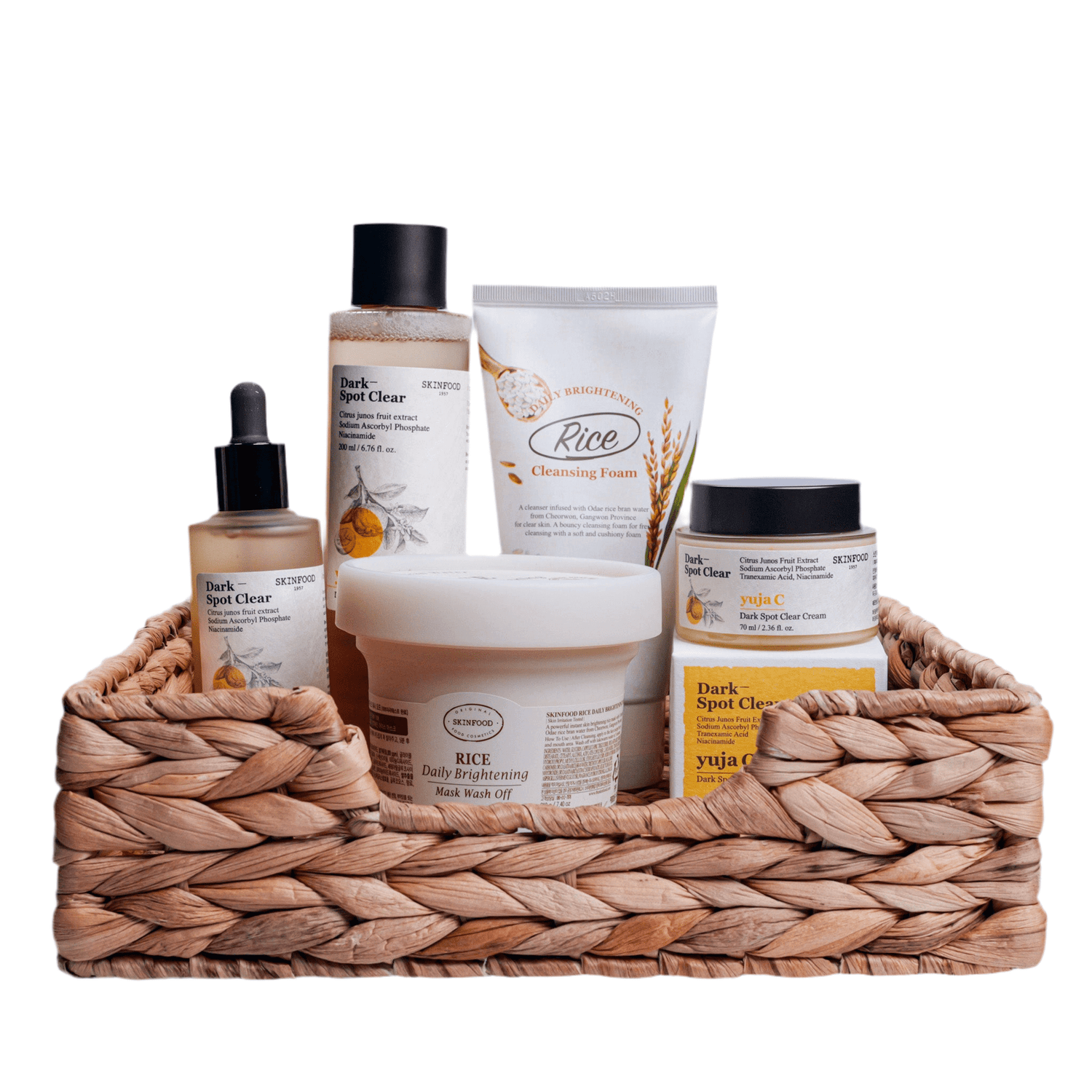 Dark Spot Removal Set 3 displayed in a woven basket with various cleansing and brightening products.